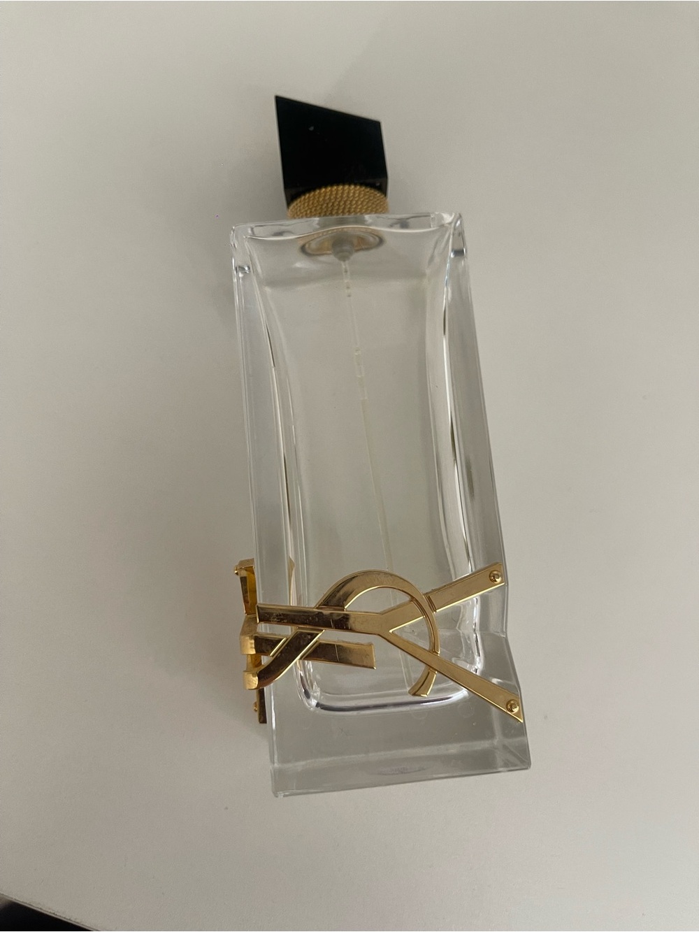 Yves Saint Laurent Clear Glass Bottle with Black Cap and Gold Accent - Picture 2 of 7